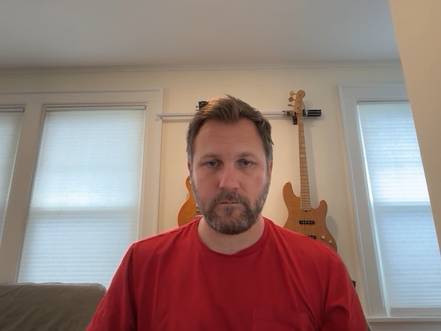 Professional taking a selfie to create their AI twin on FACEFWD